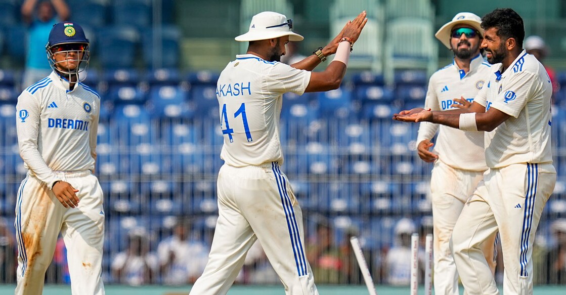 India's Jasprit Bumrah celebrates with teammates after taking the wicket of Bangladesh's Taskin Ahmed on the second day of the first Test at the MA Chidambaram Stadium in Chennai on Friday. Photo: PTI