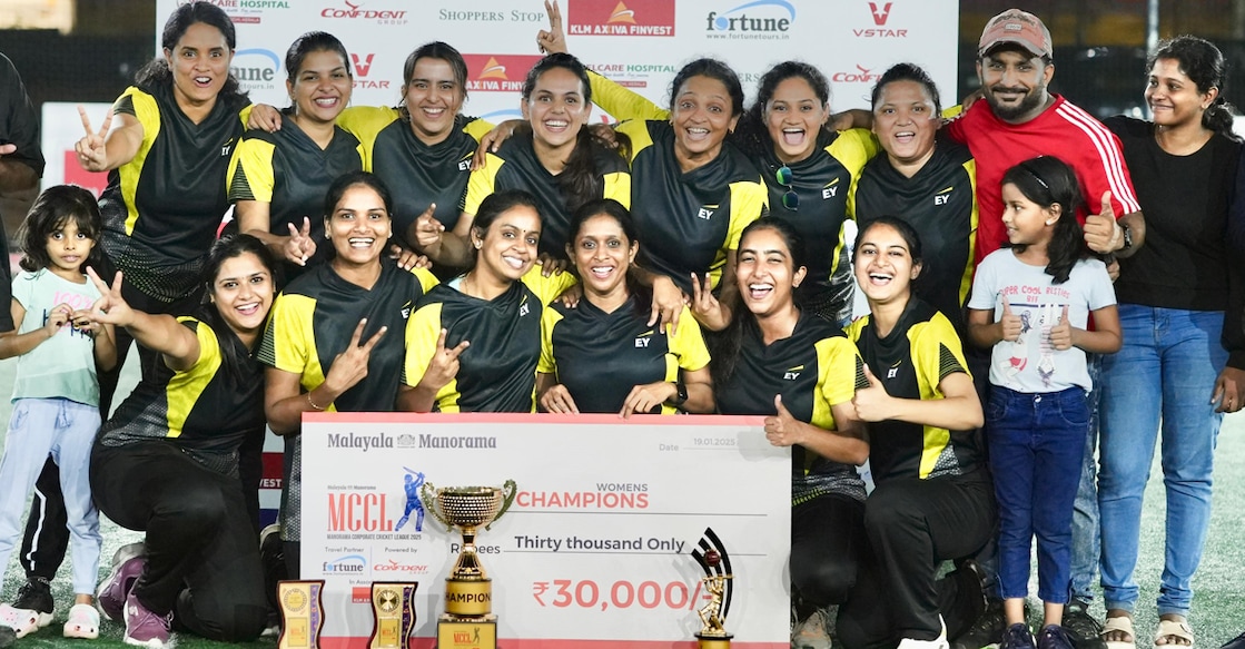 Members of team EY and friends pose after winning the men's title. Photo: Special arrangement