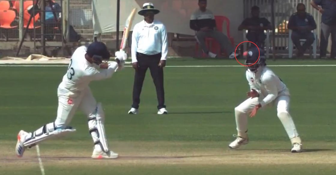 The ball hits Kerala fielder Salman Nizar's helmet (in circle) after being hit by Arzan Nagwaswalla of Gujarat. Photo: Screengrab/JioHotstar
