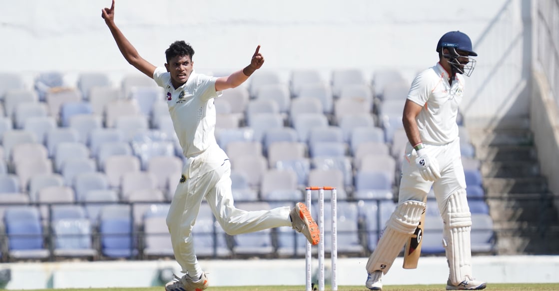 Kerala's Eden Apple Tom celebrates the wicket of Vidarbha's Dhruv Shorey on day one of the Ranji Trophy final in Nagpur. Photo: KCA