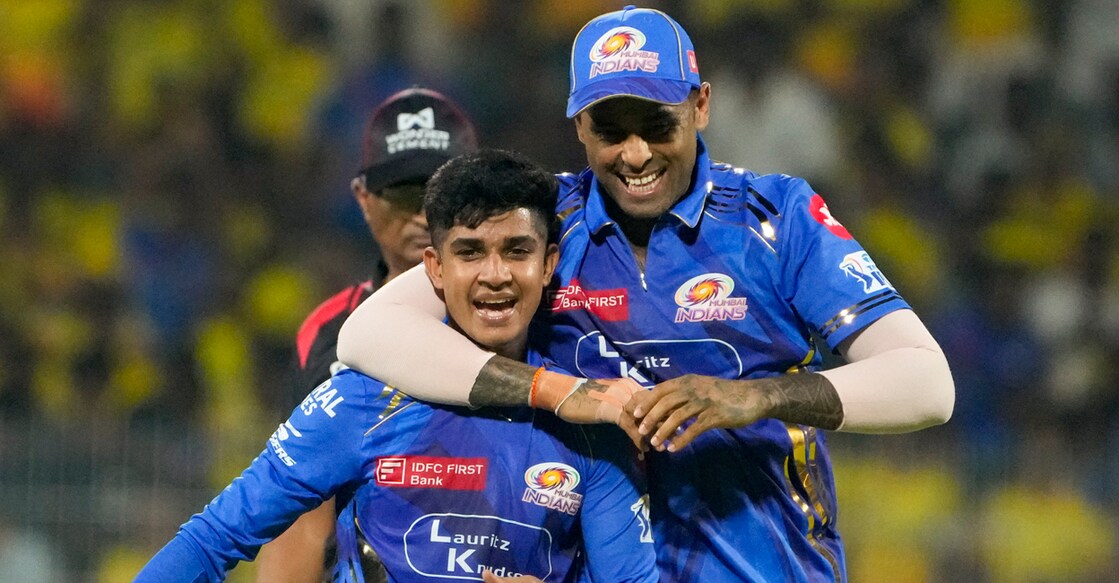 Mumbai Indians' Vignesh Puthur, with captain Suryskumar Yadav, celebrates after taking the wicket of Chennai Super Kings' Shivam Dube during the IPL 2025 match in Chennai on March 23, 2025. Photo: PTI