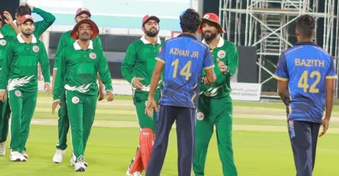 Players of Kerala and Oman greet each other after a match in Oman. Photo: Oman Cricket