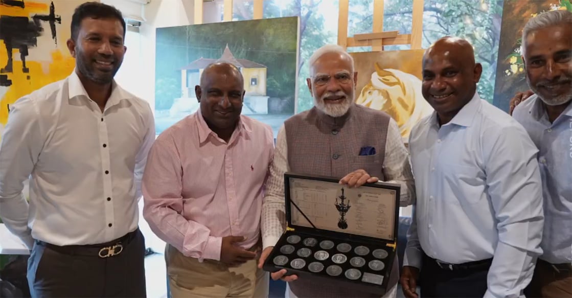 Indian PM Narendra Modi poses with former Sri Lankan cricketers. Photo: Screengrab/X@narendramodi