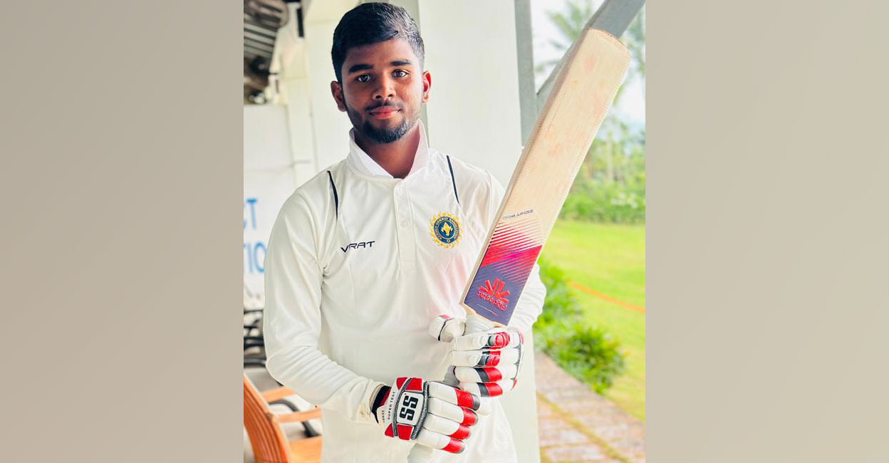 Kerala's Ahammed Imran poses after his century against Uttarakhand. Photo: KCA