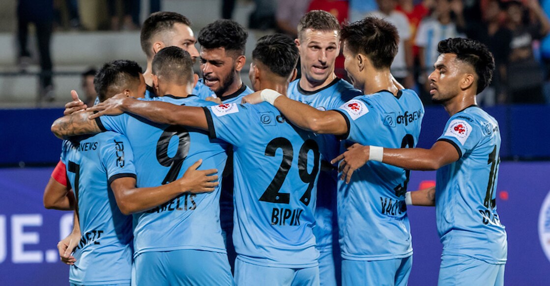 Mumbai City players celebrate their opener against Kerala Blasters in the ISL at Mumbai Football Arena on Sunday. Photo: ISL