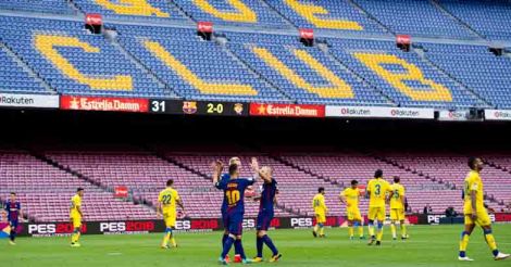 Barcelona top Las Palmas in empty Camp Nou