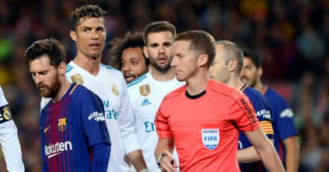 Real's Bale denies 10-man Barca win in feisty Clasico