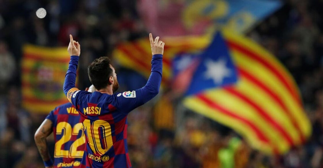 Magical Messi sends Barcelona top in Valladolid rout