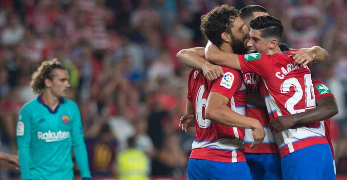 Granada stun dismal Barca to go top of La Liga