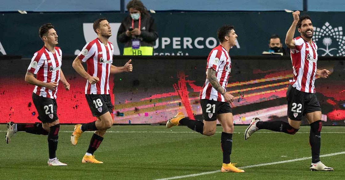 Raul Garcia, right, celebrates after scoring against Real Madrid. Photo: AFP