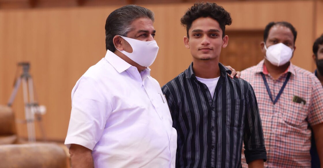 Adarsh with minister Saji Cherian. Photo: Facebook