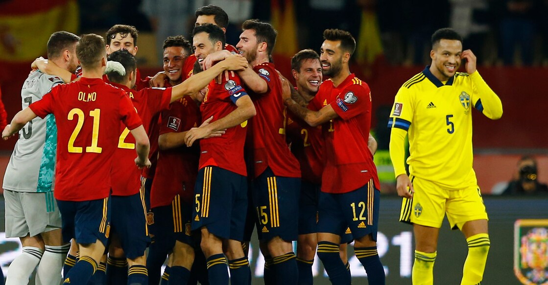 Spanish players celebrate qualifying for the World Cup. Photo: Reuters