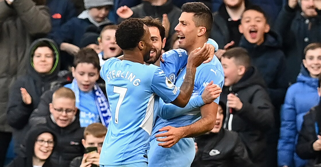 Manchester City's Rodri, right, celebrates with teammates after scoring their second goal. Photo: AFP/Paul Ellis