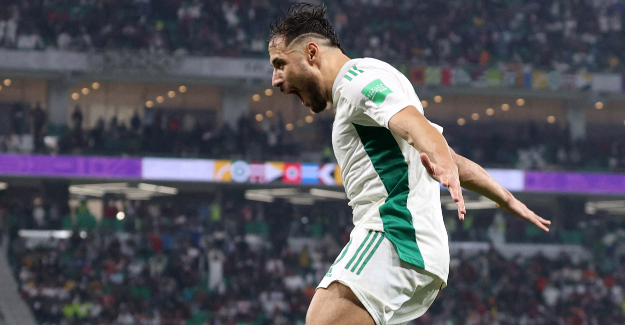 Algeria's Mohammed Belaili celebrates scoring the winner. Photo: Reuters/Suhaib Salem
