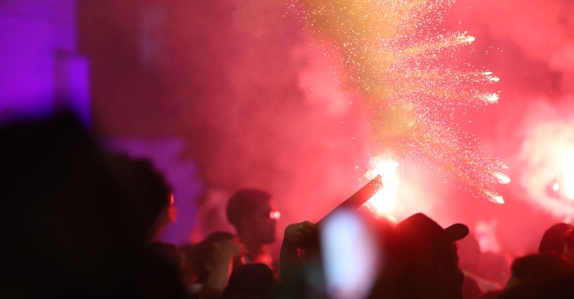 Atletico Mineiro fans celebrate with flares. Photo: Reuters/Cris Mattos
