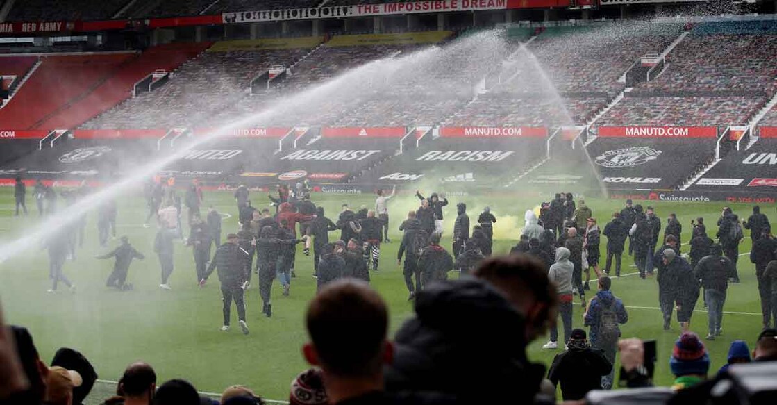 Man United-Liverpool tie postponed after fans protest