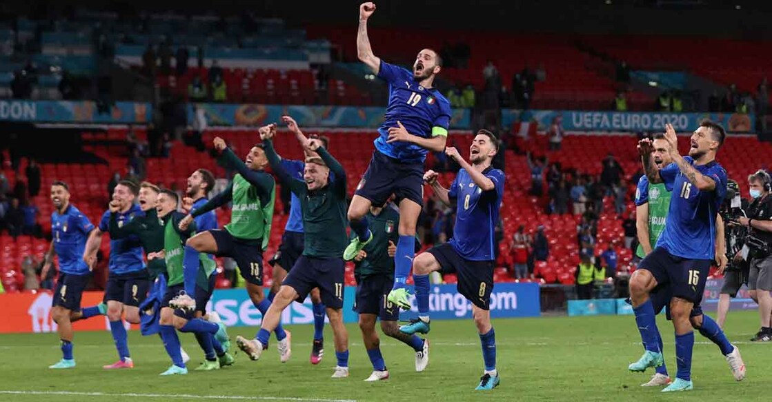 Italian players celebrate at the end of the game. Photo: Reuters