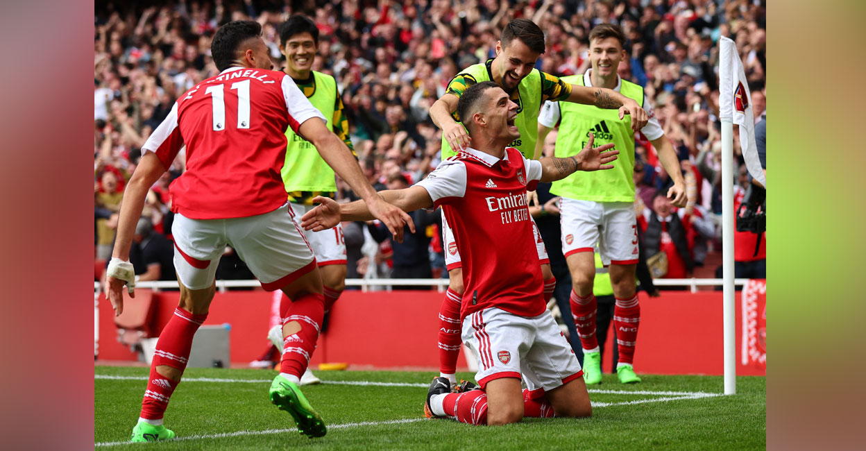 Arsenal's Granit Xhaka celebrates scoring their third goal with Fabio Vieira and Gabriel Martinelli. Photo: Reuters/David Klein