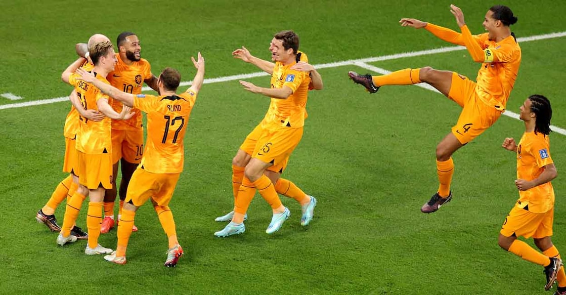 Netherlands' players celebrate  their second goal. Photo: Reuters/Molly Darlington
