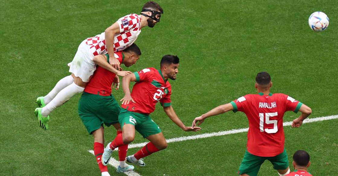 Croatia's Josko Gvardiol and Morocco's Yahya Attiat-Allah and Selim Amallah fight for the ball. Photo: Reuters/Marko Djurica