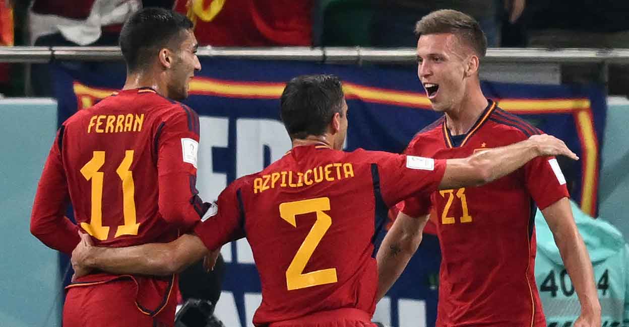 Spain Spain's Dani Olmo, right, celebrates with Ferran Torres and Cesar Azpilicueta after scoring the opening goal . Photo: AFP/Raul Arboleda