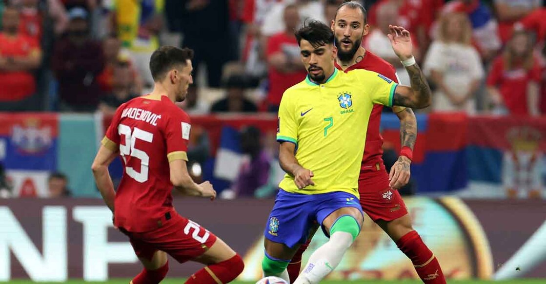Lucas Paqueta in action with Serbia'a Filip Mladenovic. File photo: Reuters/Amanda Perobelli