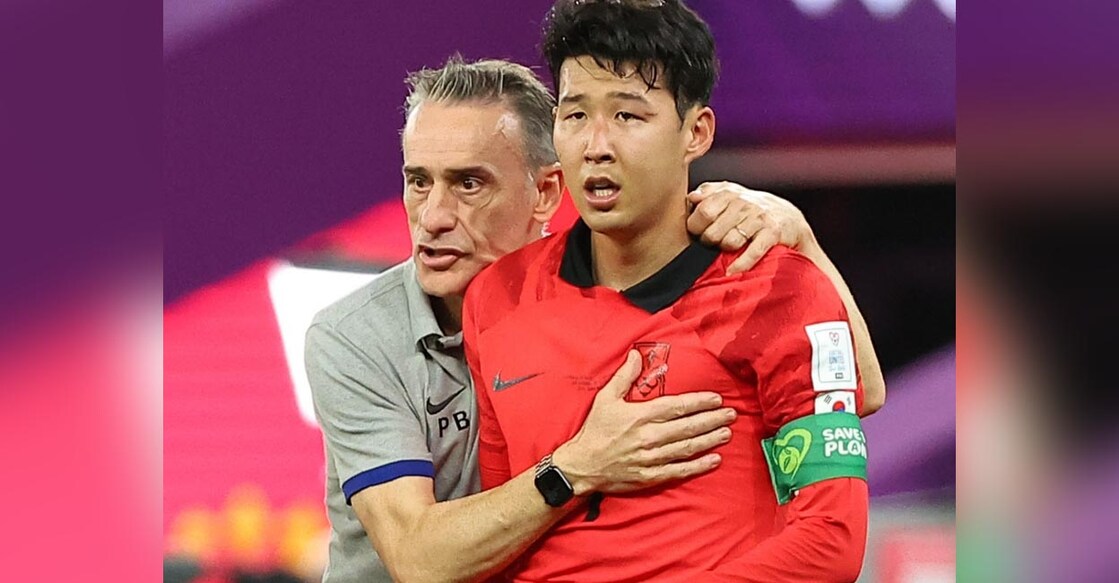 South Korea head coach Paulo Bento comforts his team's captain Son Heung-min after the team's 2-3 losing to Ghana. Photo: Yonhap/IANS