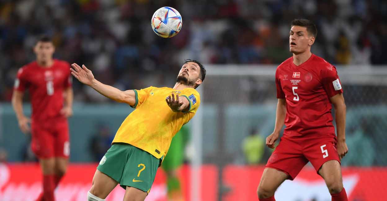 Action between Australia (yellow) and Denmark. Photo: Twitter/ @Socceroos