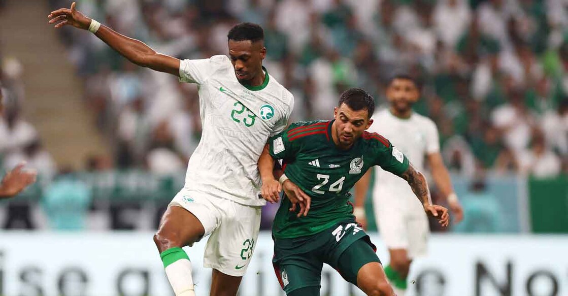 Saudi Arabia's Mohamed Kanno in action with Mexico's Luis Chavez. Photo: Reuters/Matthew Childs