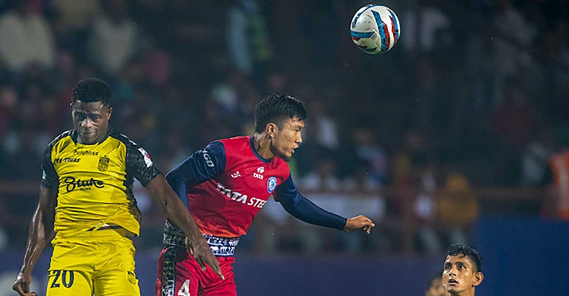 Laldinpuia Pachuau of Jamshedpur FC (4) and Bartholomew Owogbalor Ogbeche of Hyderabad FC (20) during their Indian Super League 2022 football match, at JRD Tata Sports Complex in Jamshedpur, Wednesday, November 9, 2022. Photo: PTI