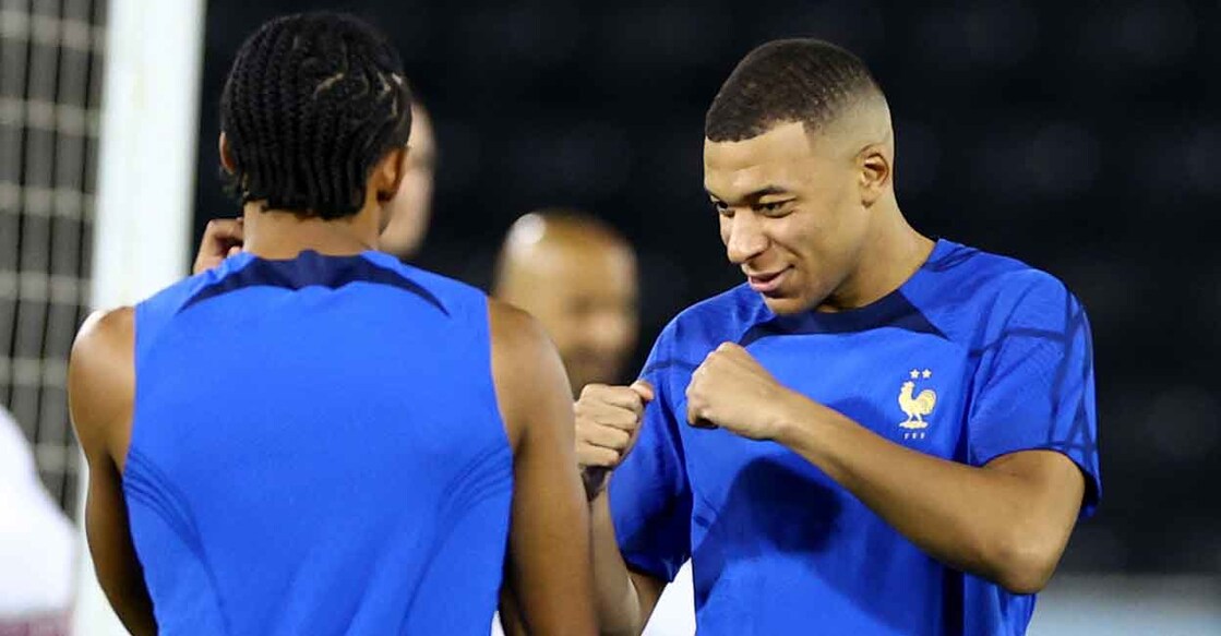 France's Kylian Mbappe stays relaxed during a training session in Doha on Tuesday. Photo: Reuters/Ibraheem Al Omari