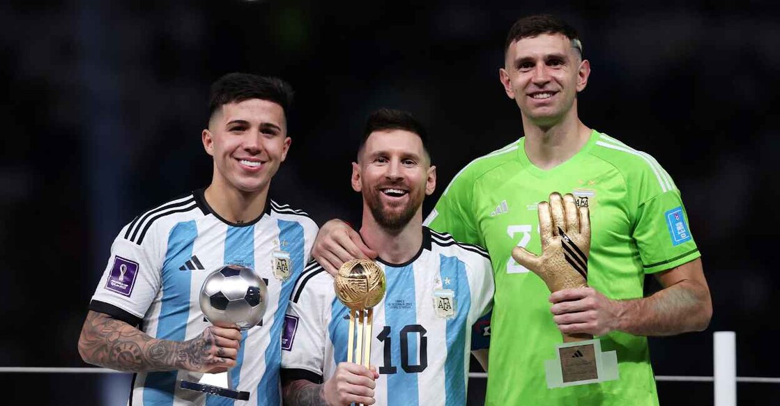 Argentina's Enzo Fernandez, Lionel Messi, Emiliano Martinez with their awards. Twitter/FIFA World Cup