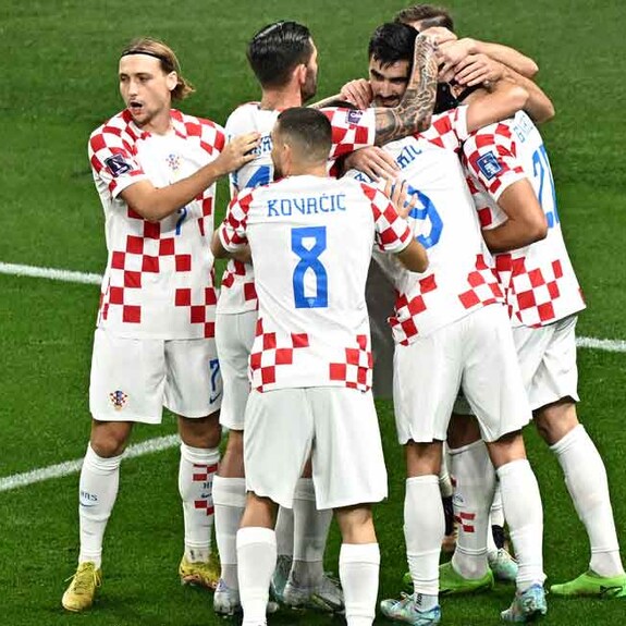 Croatia Croatian players celebrate their opening goal. Photo: AFP/Anne-Christine Poujoulat