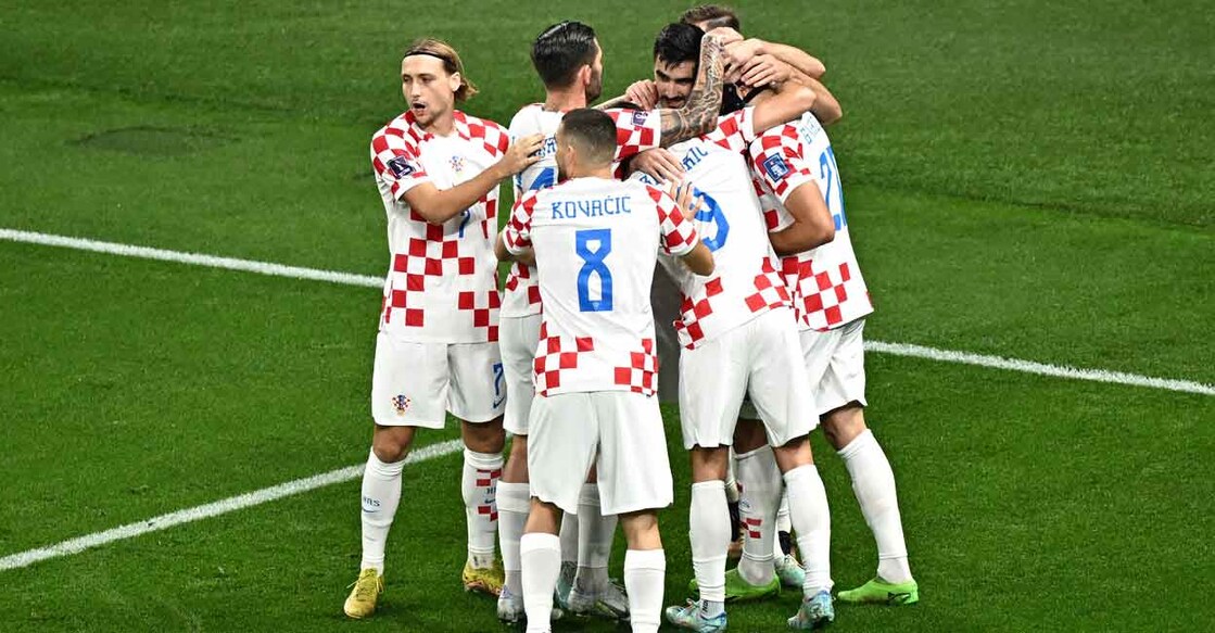 Croatian players celebrate their opening goal. Photo: AFP/Anne-Christine Poujoulat