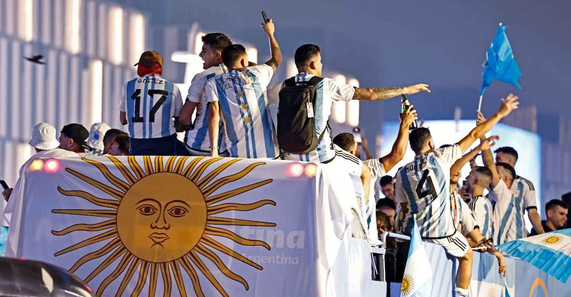 Argentina players celebrate on a bus outside the stadium after winning the World Cup REUTERS/Hamad I Mohammed