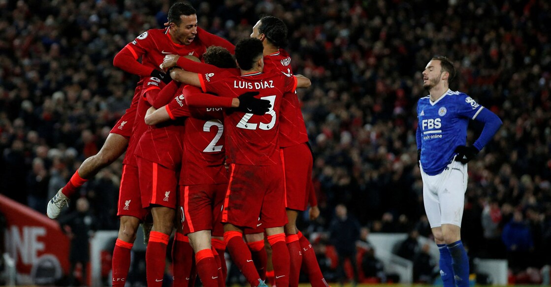 Liverpool players celebrate their second goal. Photo: Reuters/Craig Brough