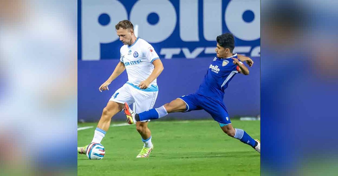 Greg Stewart (left) of Jamshedpur and Anirudh Thapa of Chennaiyin vie for the ball during an Indian Super League match on Sunday. Photo: Twitter/ @IndSuperLeague