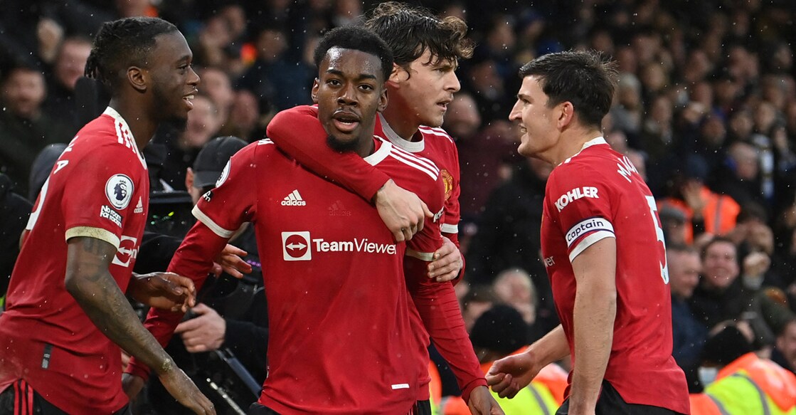 Manchester United's Anthony Elanga, centre, celebrates with teammates after scoring his team fourth goal. Photo: AFP/Paul Ellis
