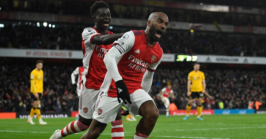 Arsenal's Alexandre Lacazette celebrates scoring their second goal with Bukayo Saka. Photo: Reuters/Tony Obrien