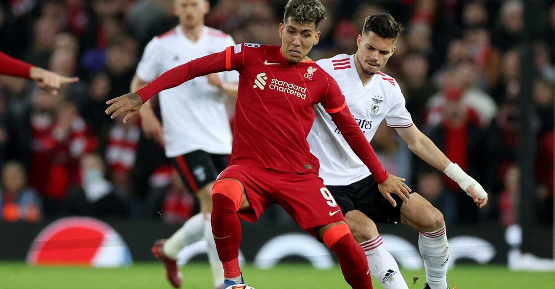 Liverpool's Roberto Firmino in action with Benfica's Julian Weigl. Photo: Phil Noble/Reuters