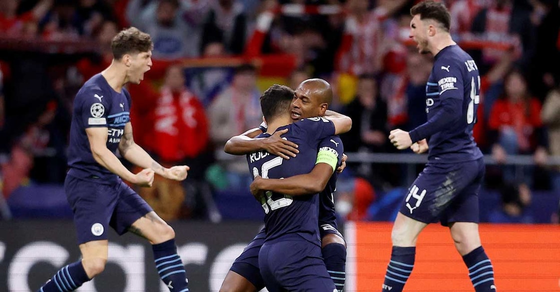 Manchester City's Rodri celebrates with Fernandinho after the match. Photo: Juan Medina/Reuters