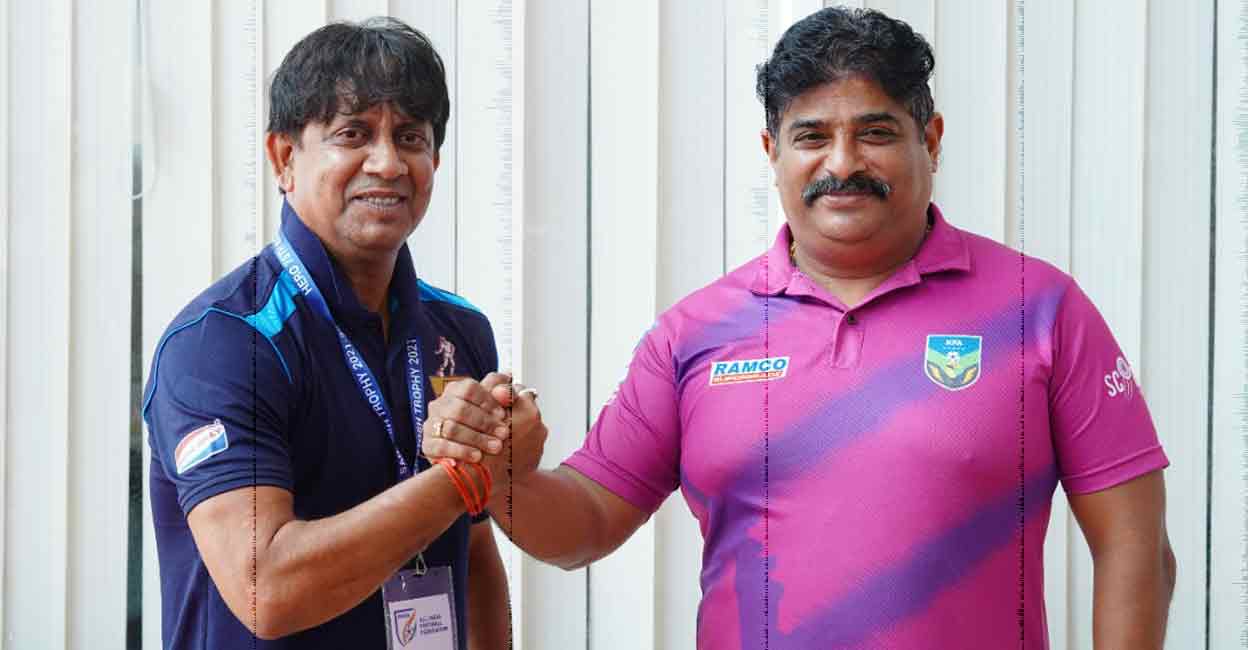 Santosh Trophy pic Ranjan Bhattacharjee and Bino George, head coaches of West Bengal and Kerala respectively pose on the eve of the final in Malappuram. Photo: Special arrangement.