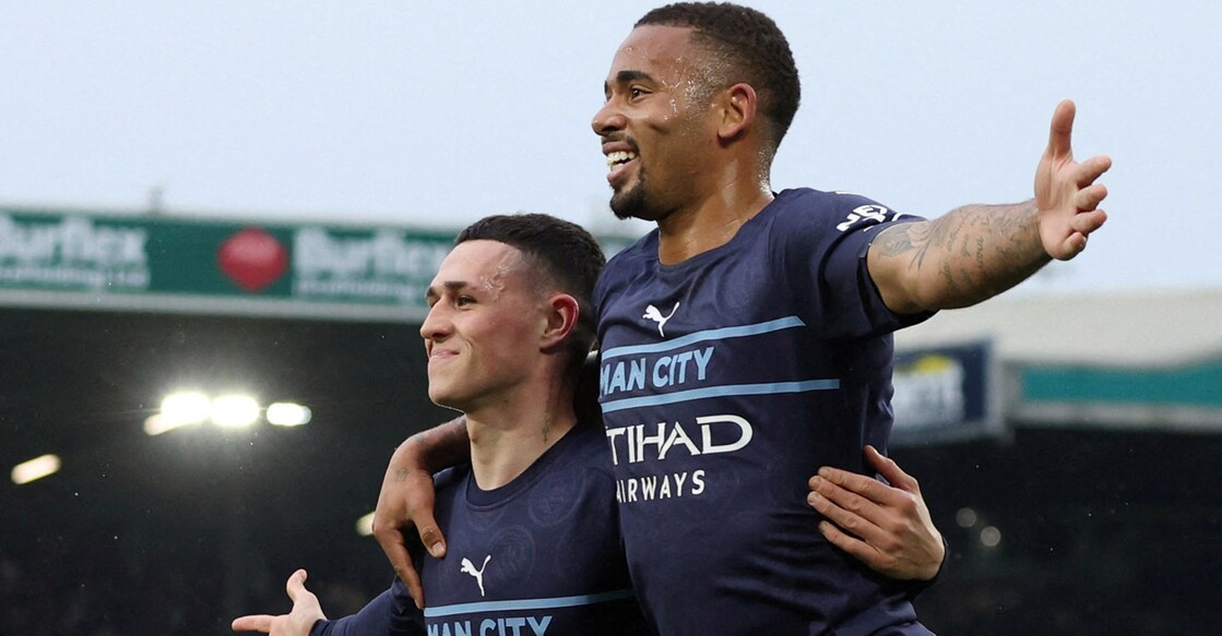 Manchester City's Gabriel Jesus, right, celebrates with Phil Foden after scoring their third goal. Photo: Reuters/Phil Noble
