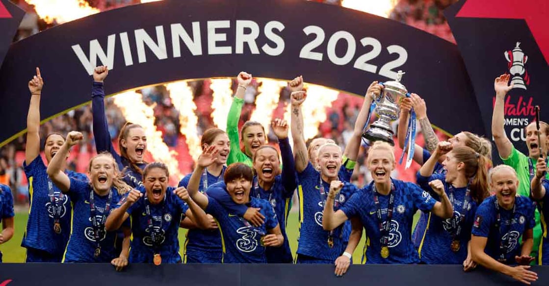 Chelsea players celebrate with the trophy after winning the Women's FA Cup. Photo: Reuters/ John Sibley