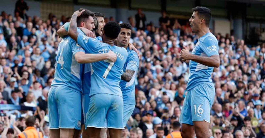 Manchester City's Aymeric Laporte celebrates scoring their second goal with teammates. Photo: Reuters/Jason Cairnduff 