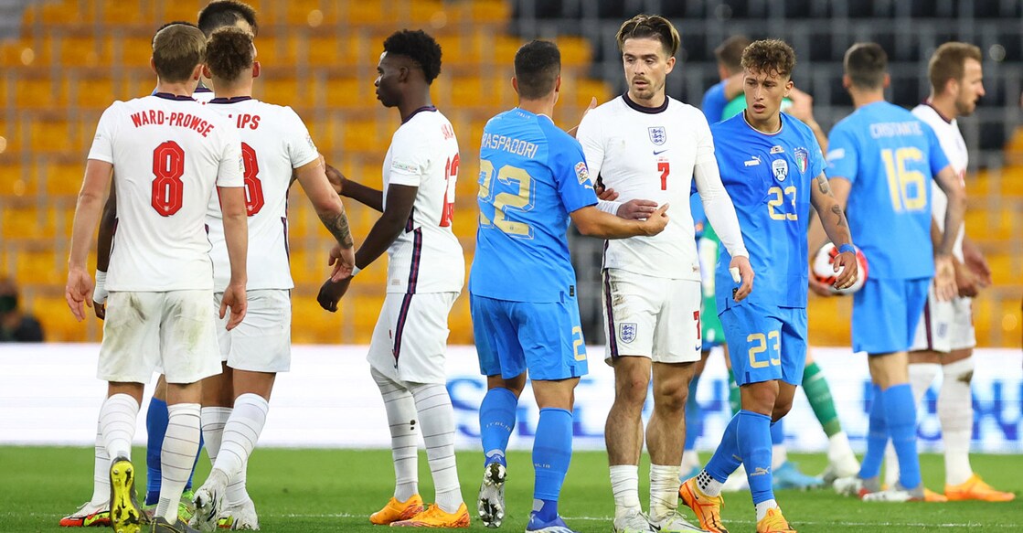 England and Italy players greet each other after the match. Photo: Reuters/Hannah Mckay
