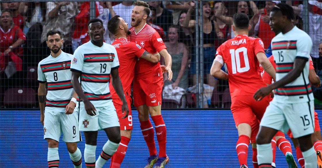Switzerland's forward Haris Seferovic, fourth left, celebrates after scoring the winner against Portugal. Photo: AFP/Fabrice Coffrini