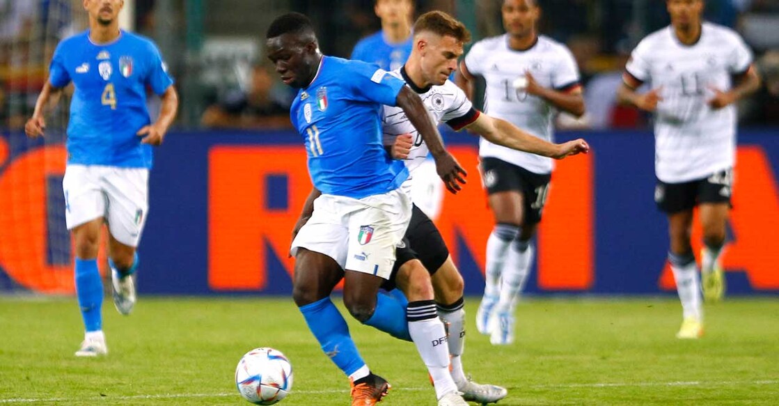 Italy's Degnand Wilfried Gnonto in action with  Germany's Joshua Kimmich. Photo: Thilo Schmuelgen/Reuters