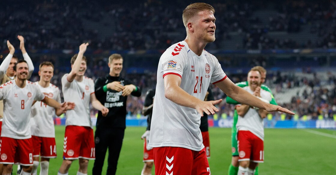 Denmark's Andreas Cornelius celebrates with his teammates after the match. Photo: Reuters/Christian Hartmann