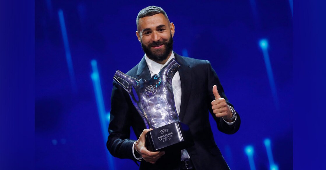 Real Madrid's Karim Benzema poses with the men's player of the year award. Photo: Reuters/ Murad Sezer